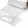 Close-up of the opening and perforation on clear bags on a roll
